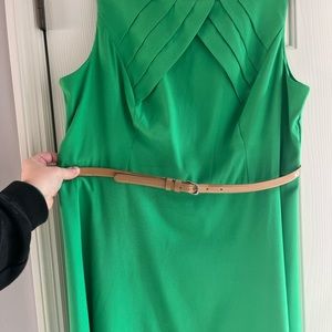 Gorgeous color for spring, this dress is in excellent used condition.